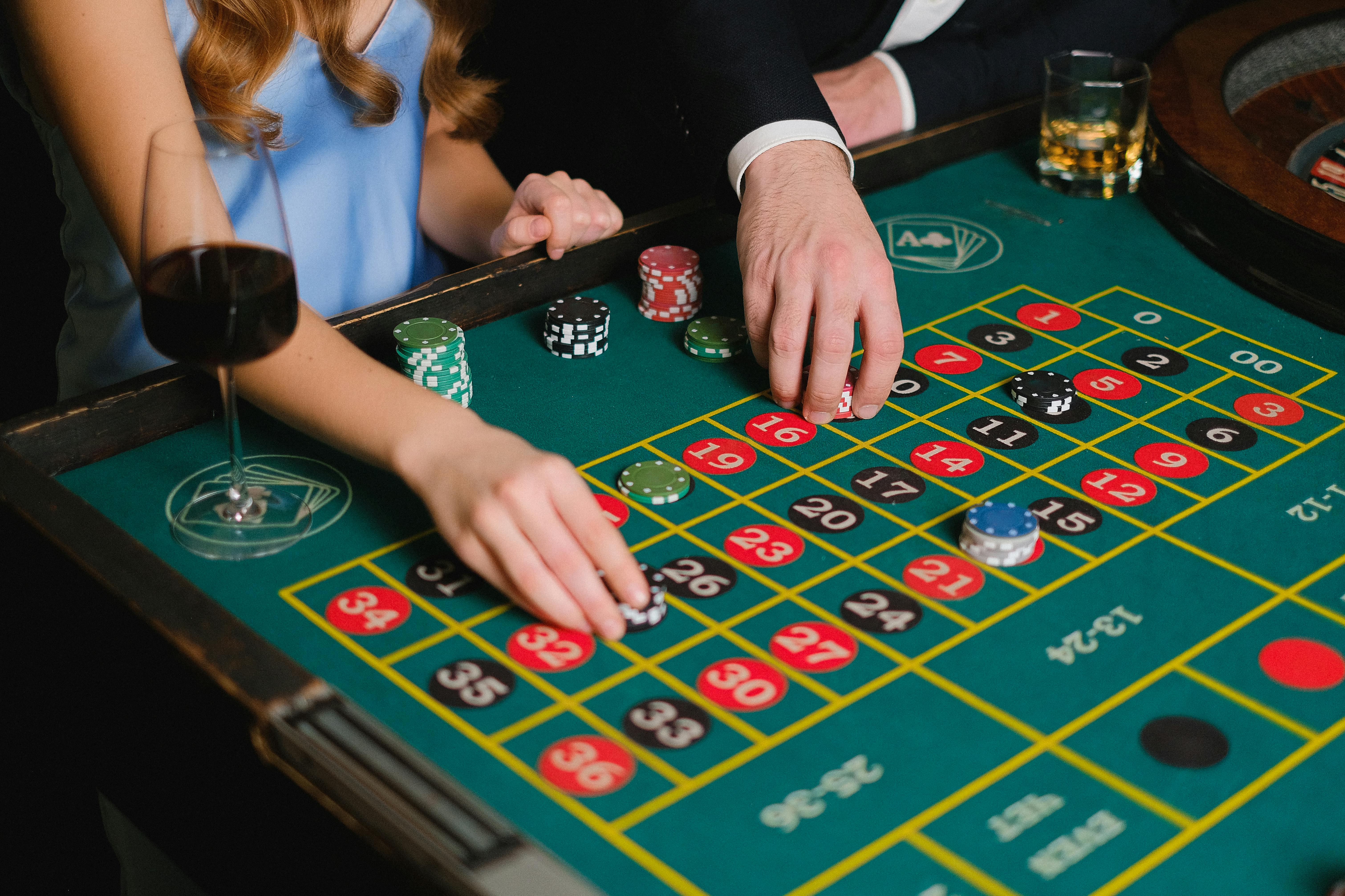 Poker chips and cards arranged on casino table